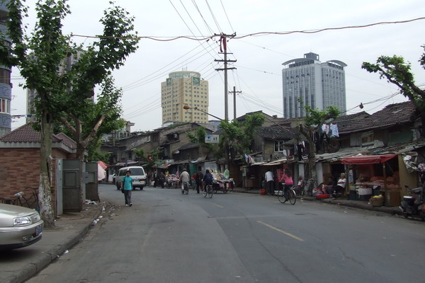 Шанхай многоликий город, рядом  с фантастической рокошью,<BR> соседствует откровенная нищета. Шанхая shanhai