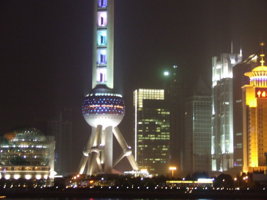 Вечерняя подсветка телебашни Восточной жемчужины Шанхая shanhai